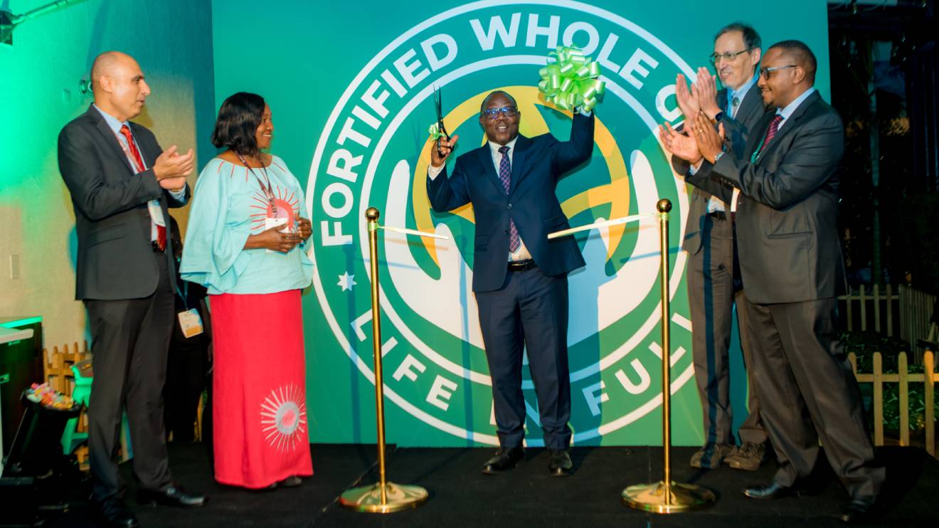 Jean Claude Musabyimana (centre) officially launches the Fortified Whole Grain Alliance (FWGA) joined by David Kama, Roy Steiner  and Betty Kibaara. PHOTO/COURTESY